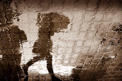 A Boy Enjoying Rain Seasons