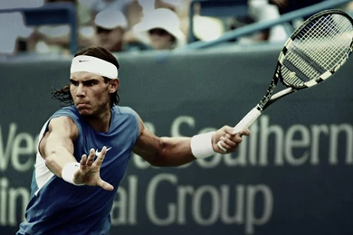 Rafael nadal playing tenis blue hd.jpg