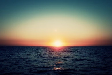 2560x1440 Sunset At Sea Desktop PC And Mac Wallpapers