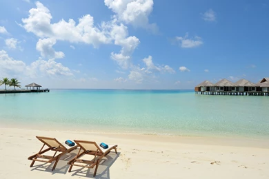 Download Wallpapers 3840x2160 Beach, Sand, Chairs, Resort, Sky ...