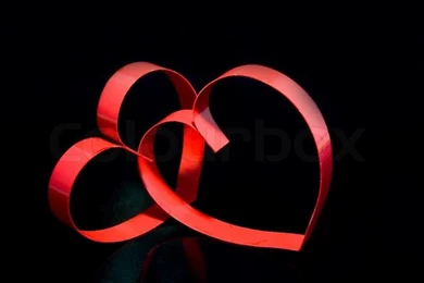 St. Valentine Day. Couple Of Hearts, On Black Backgrounds Stock Photo