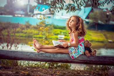 Cute little girl with teddy bear wide wallpaper.jpg