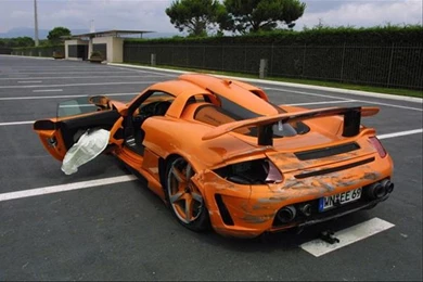 Porsche Carrera Gt Crash Flodtc   FewMo.com – Cool Car Wallpapers