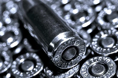 Shiny Pistol Bullets 1080p Hd Desktop Wallpaper.jpg