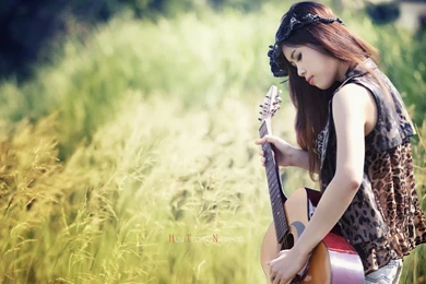 Girl Playing Guitar In The Field Widescreen Wallpapers
