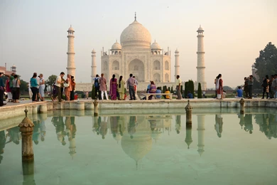 Tourists On The Backgrounds Of The Mausoleum Mosque Taj Mahal In ...
