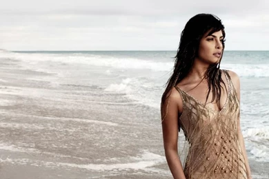 Download 1366x768 Priyanka Chopra On A Sea Shore Wallpapers