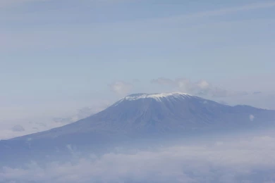 File:Mount Kilimanjaro Aerial View On A Cloudy Background.JPG ...