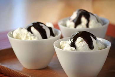 Vanilla Ice Cream In A Bowl With Chocolate Syrup   Wallpaper.