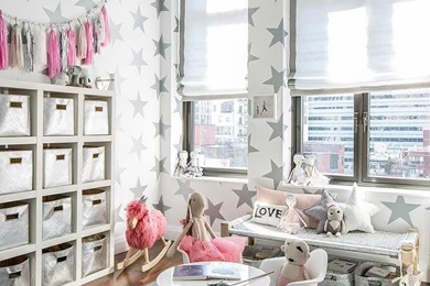 Nursery With Silver Baskets Tucked Under A Silver Bench ...