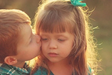 Child Love Little Boy Kissing A Girl