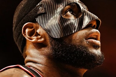 Download LeBron James In A Mask Looking Up Wallpapers For iPhone 4