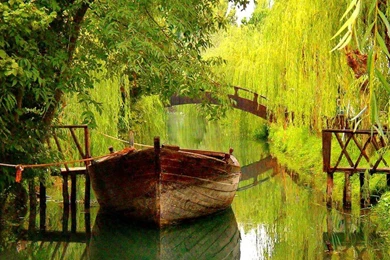 BOAT IN CALM LAKE WALLPAPER   (