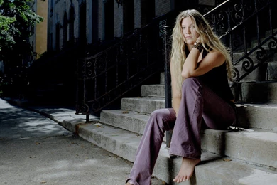 Joss Stone Resting On The Stairs Wallpapers