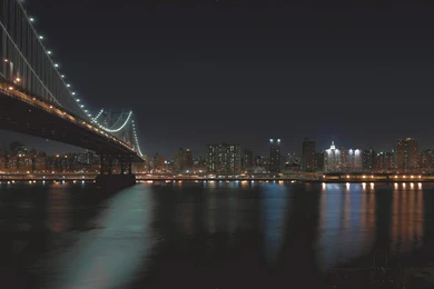 Stock Photo Night Time View Of Brooklyn Bridge Over Water With Light