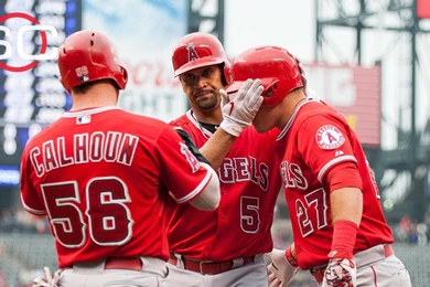Pujols, Trout Homers Lead Angels Past Rockies, 10 2.