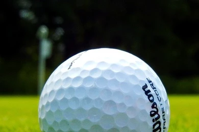 Download Three Wilson Golf Balls Wallpapers For iPhone 4