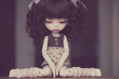 Sad Doll Sitting (
