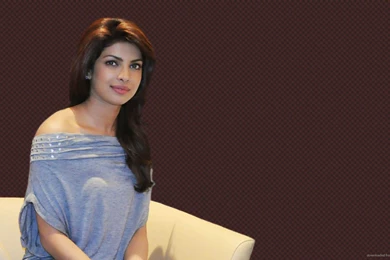 HD Priyanka Chopra In White Chair Wallpapers