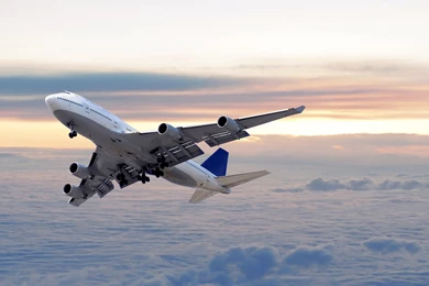 Free Commerical Airplane Over Clouds Computer Desktop Wallpapers