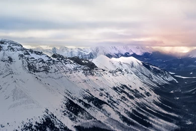 Snowy Mountain Range Distant Storm 4K Desktop Wallpapers