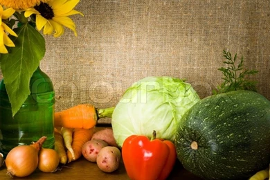 Still Life With Vegetables And Sunflowers In Green Bottle Burlap ...