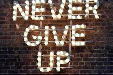 Brick Wall Marquee Lights Never Give Up iPhone Phone Backgrounds ...