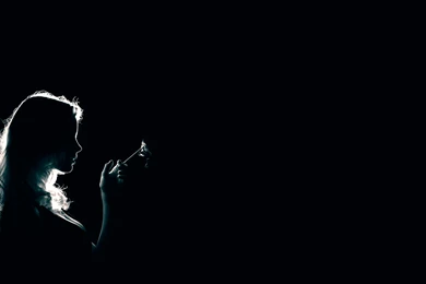 Girl Smoking Cigarettes Shadow On Black Backgrounds