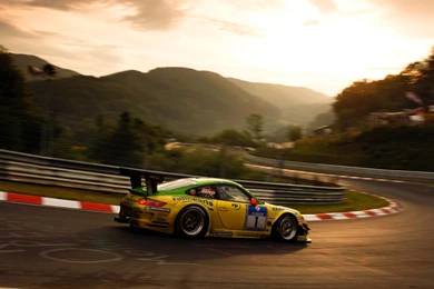 Race Car Backgroundporsche Racing Car On Turn Tech Screen ...