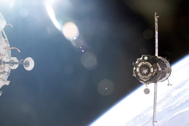 Download 2560x1440 Soyuz Spacecraft Wallpapers