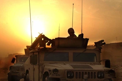 ROLLING IN HUMMER AT SUNSET MILITARY WALLPAPER   (