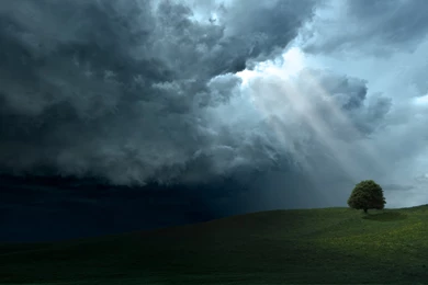 Sunlight Through Dark Clouds   Wallpaper.