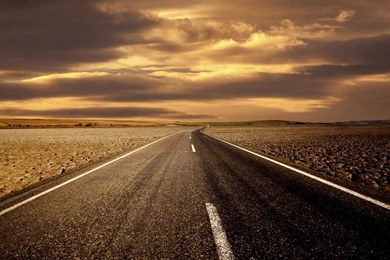 Empty Road At Sunset