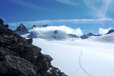 Download Wallpapers 2560x1440 Stones, Snow, Mountains, Sky, Sun ...