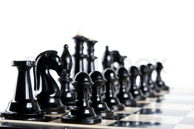 Black Chess Pieces Isolated On A White Backgrounds