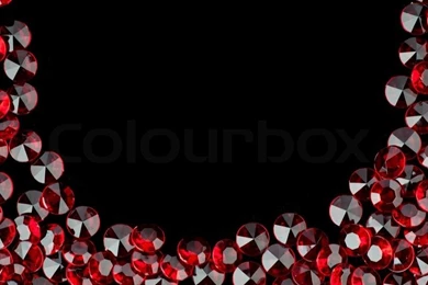 The Red Crystal On A Black Backgrounds Stock Photo