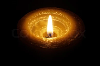 Candle On Black Backgrounds