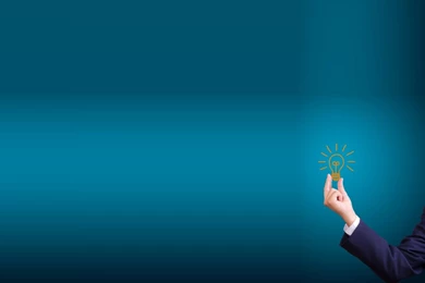 Hand Holding Light Bulb For Powerpoint Templates PPT Backgrounds ...