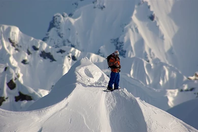 Snowboarder Travis Rice Conquers Treacherous Mountain Face ...