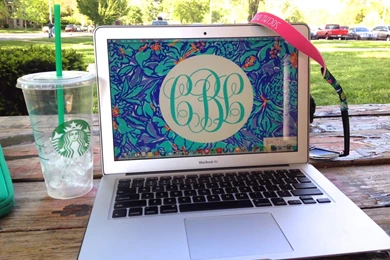 Behind Her Monogrammed Macbook: But Is It Really Monogrammed?
