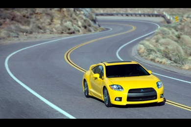 2009 Mitsubishi Eclipse GT   Front Angle Speed Winding Road ...