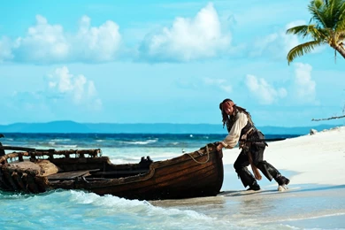 Jack Sparrow Pushing Boat Desktop Wallpapers