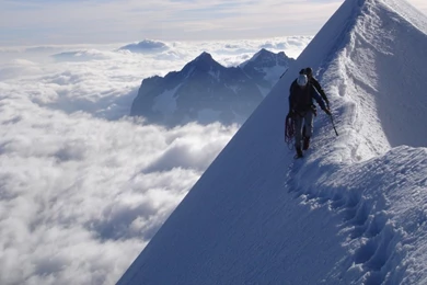 1366x768 Climber Snowy Mountain Top Wallpapers