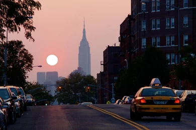 Empire State Building In The Distance At Sunset   (