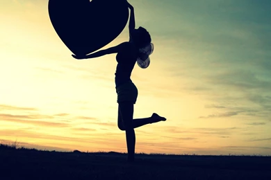 Silhouette of a girl holding a heart photography hd wallpapers ...