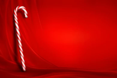 Christmas_Red_Background_with_Candy_Cane.jpg?m=1399676400