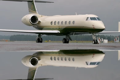 Bizjet Gulfstream G550 Reflected By Water Wallpapers 802