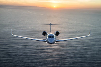 Gulfstream G650 Business Jet Cruising On Sunset Scene