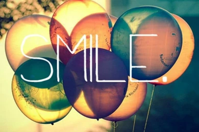 Smile Text Written On Retro Colored Ballons