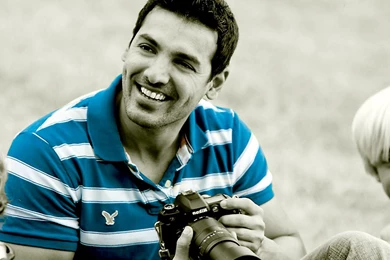 John Abraham Smile With Camera Wallpapers   HD Wallpapers